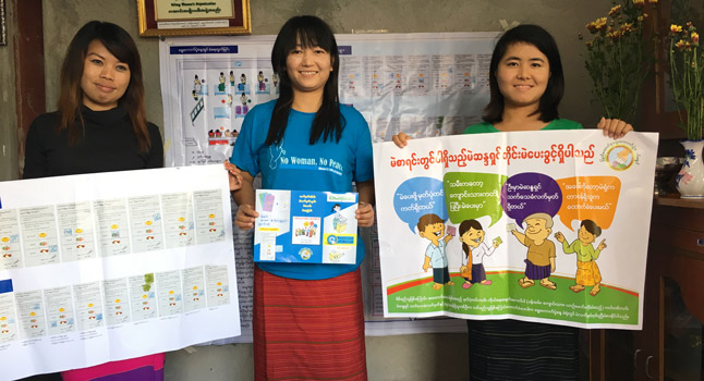 Lway Hanner, Lway Poe Myiam and Lway Ku Ku display voter education materials.