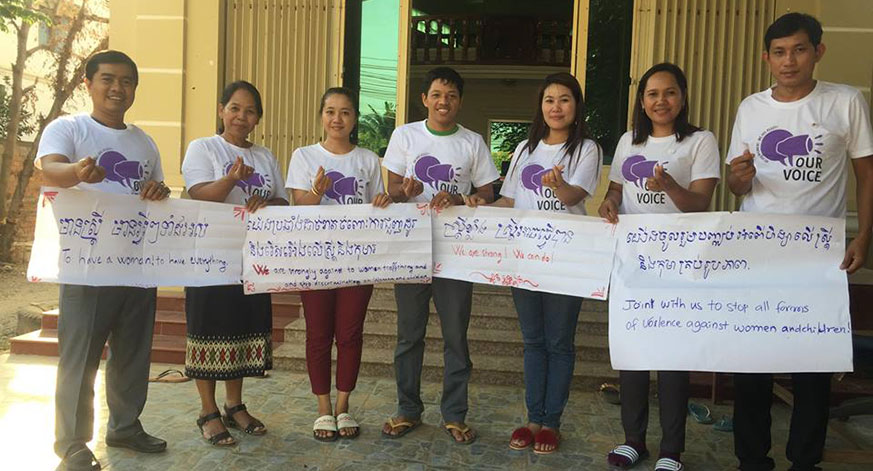 Banteay Srei staff sharing their Our Voice campaign messages: “We are strong! We can do!”