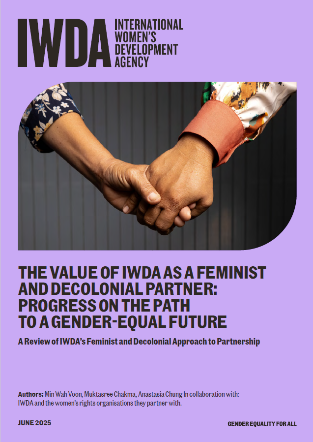 Cover shows close-up photo of two hands held together in friendship.