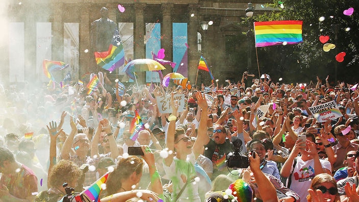 The crowd outside the State Library in Victoria celebrates the Yes vote. Photo: Scott Barbour/Getty Images