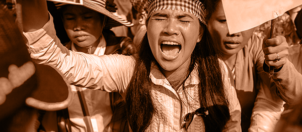 Image of a woman protesting.