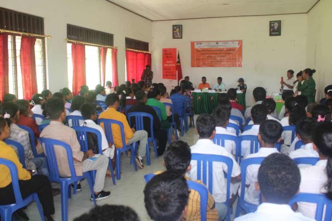 People are gathered in a room for CCC's awareness-raising session.